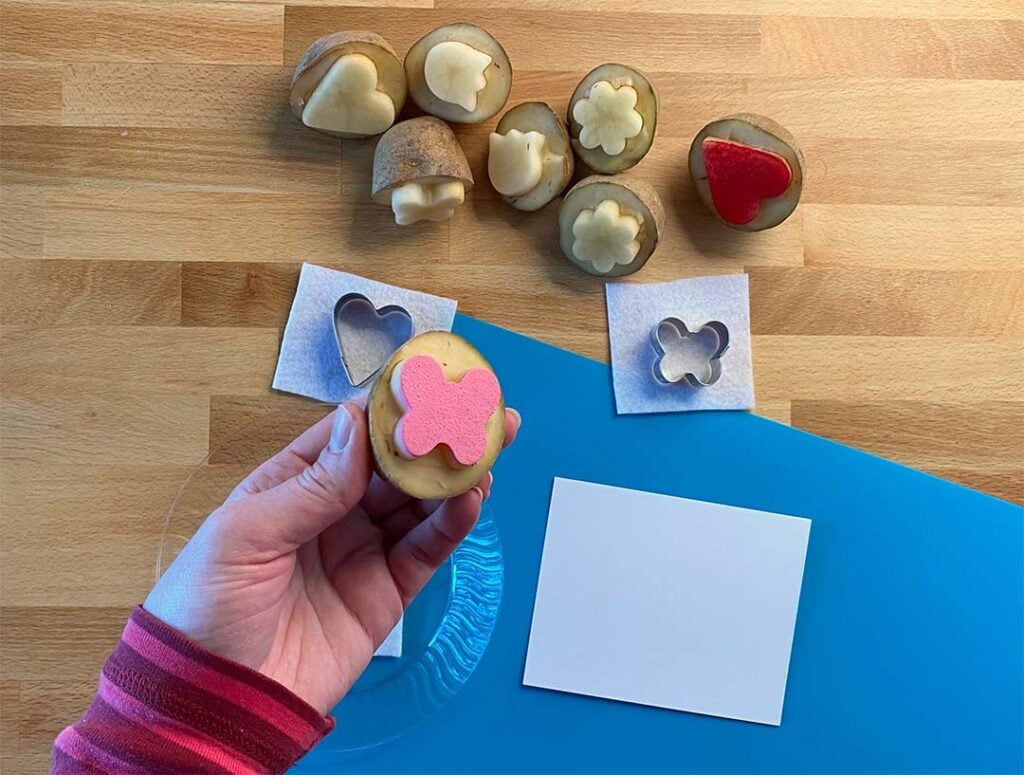 Stamping with potato stamps with DIY felt stamp pad