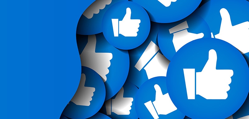 a bunch of thumb emojis on a blue background