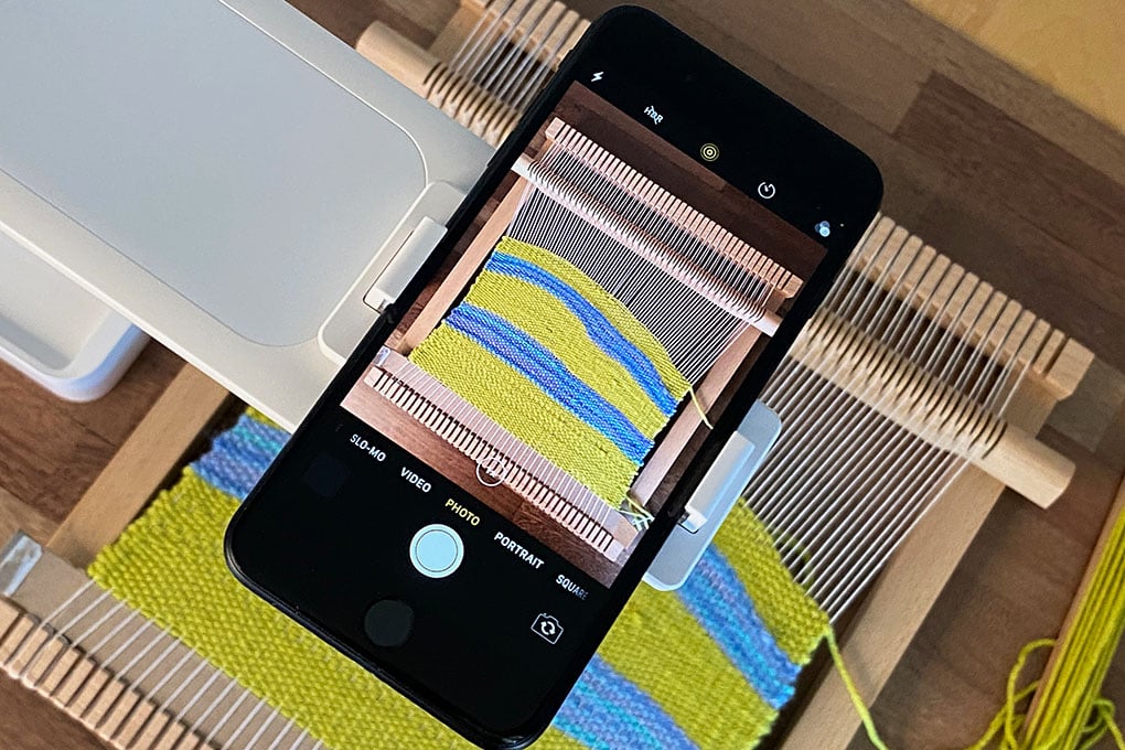 titled angle of phone camera filming loom in progress