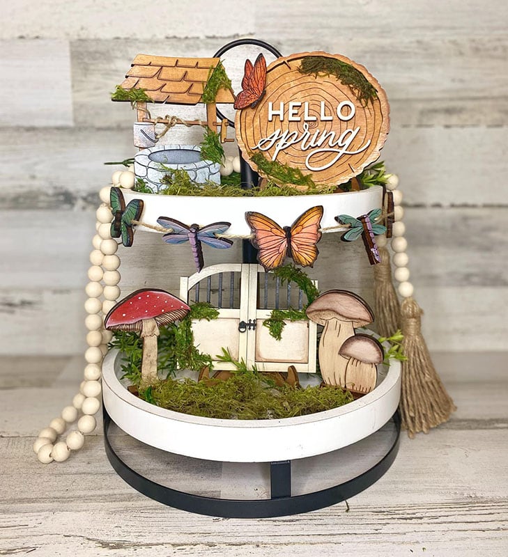 Tiered Decor with spring themed signs and cut outs by Doodle Moon Creations