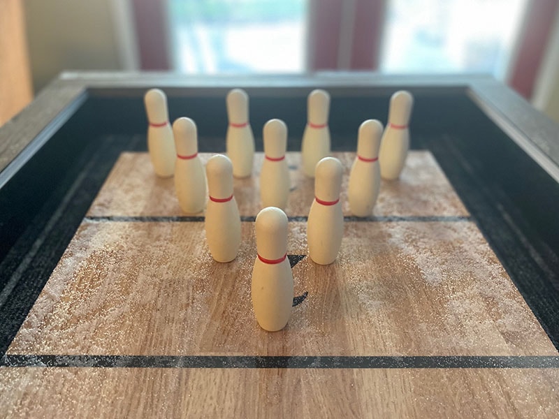 shuffle board in the living room at gamer haven