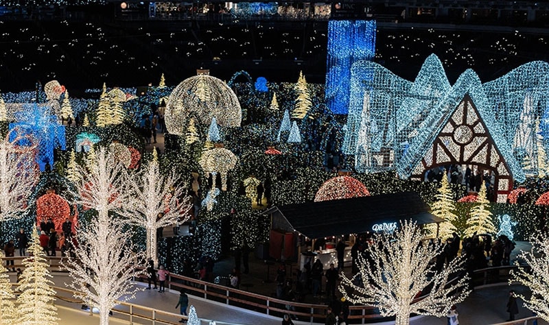 A village is fully covered in christmas lights at Enchant Dallas