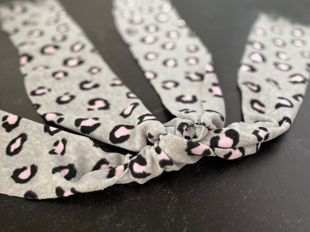 Several strips of fleece fabric have been tried into a central knot