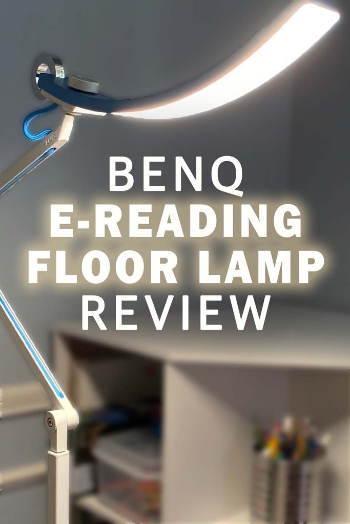 A benq e-reading floor lamp stands next to a corner bookshelf.  The lamp is blue and the bookshelf is white. Text reads "benq e-reading floor lamp review"