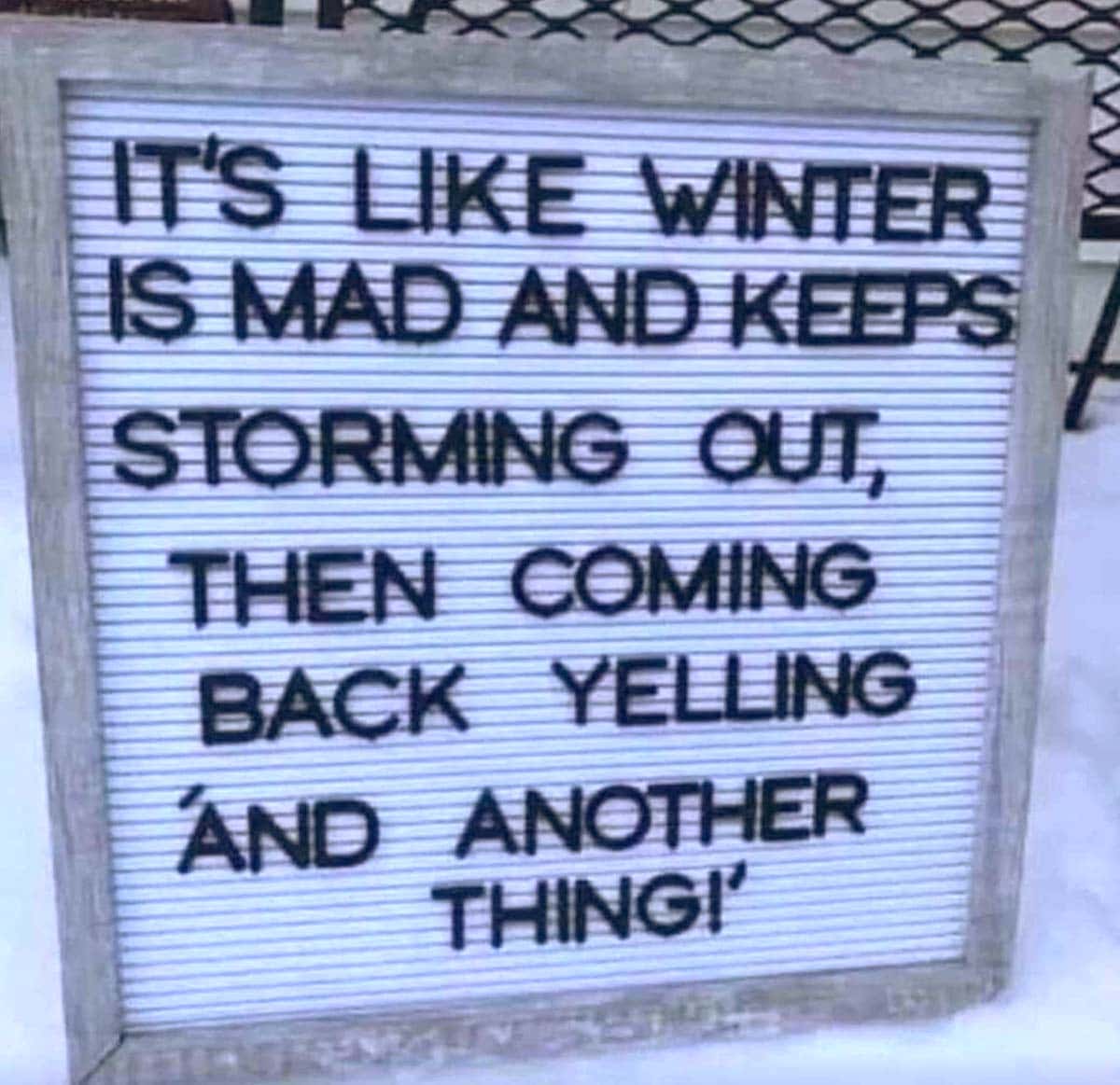 a marquee sign covered in snow reads "it's like winter is mad and keeps storming out, then coming back yelling 'and another thing!'"